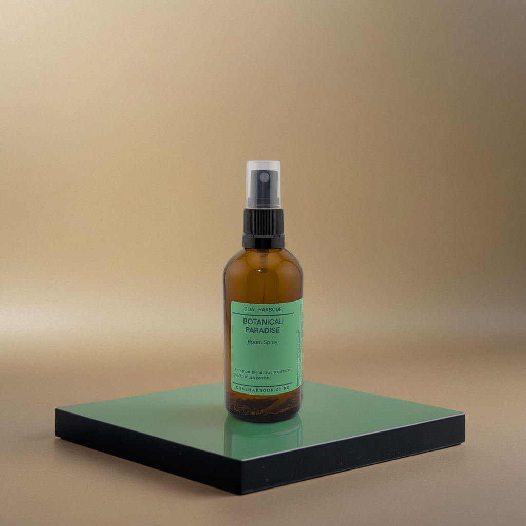 Brown spray bottle with green label on a reflective surface against a beige background