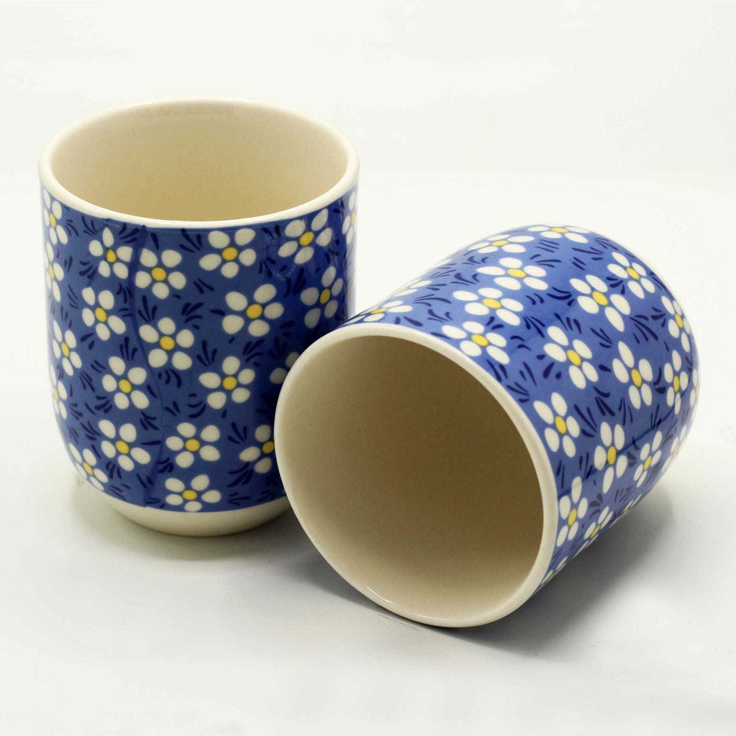 Six Herbal teacups no handle blue floral daisy design