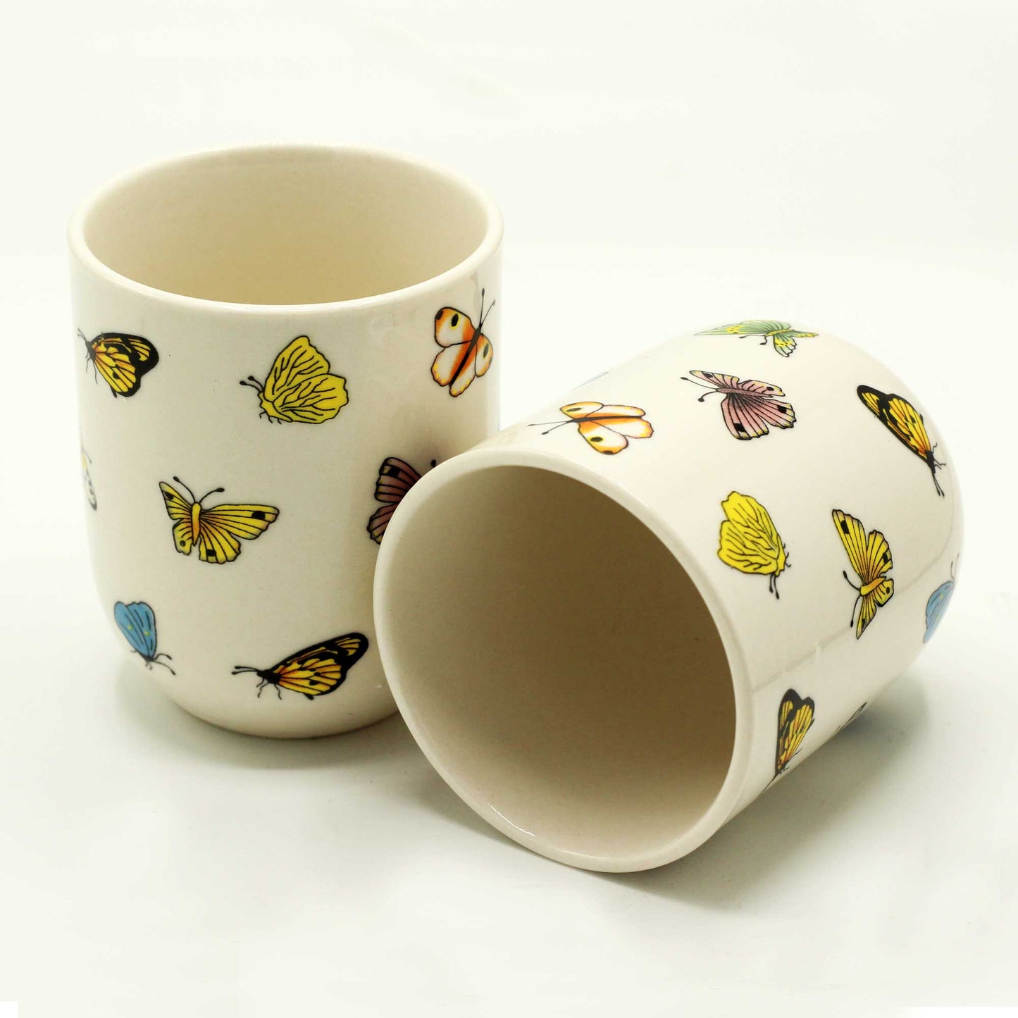 Six Herbal teacups no handle butterfly design