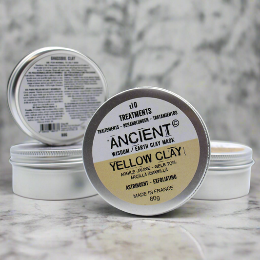 Yellow clay face mask powder in tin